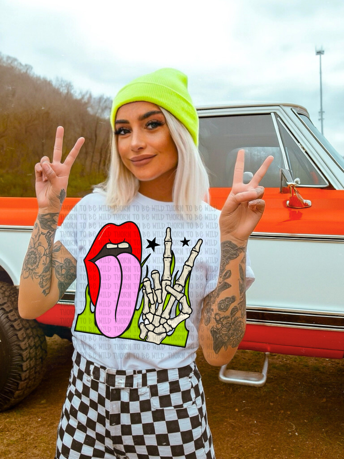 Tongue skelly peace sign